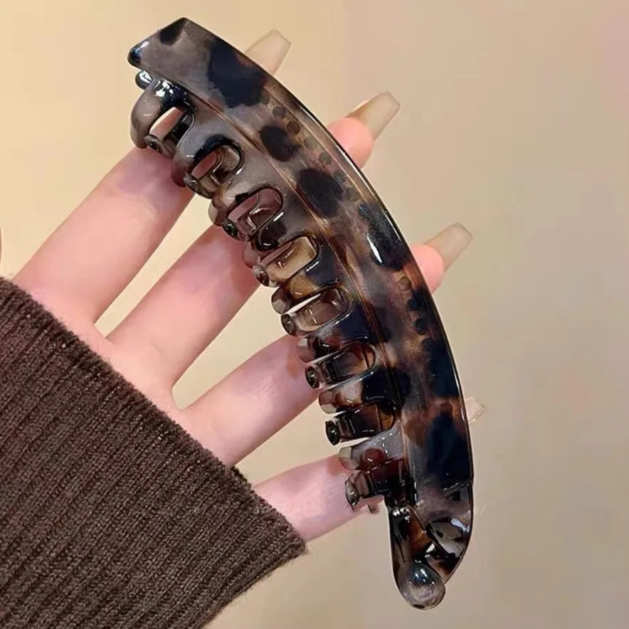 Large high tail clip with natural fluffiness and increased hair volume. Banana clip with toothed anti slip vertical clip at the
